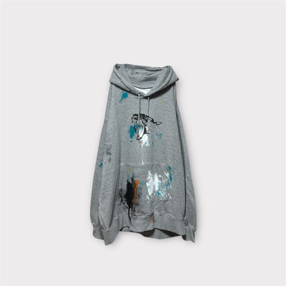 Aggressive paint extra over hoodie