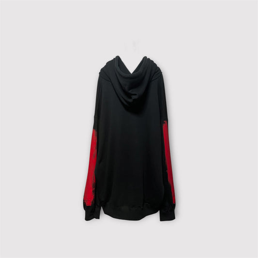 Aggressive paint extra over hoodie