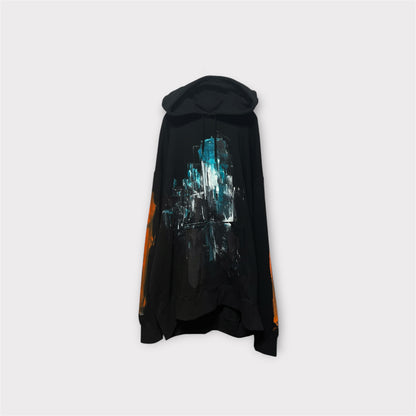 Aggressive paint extra over hoodie