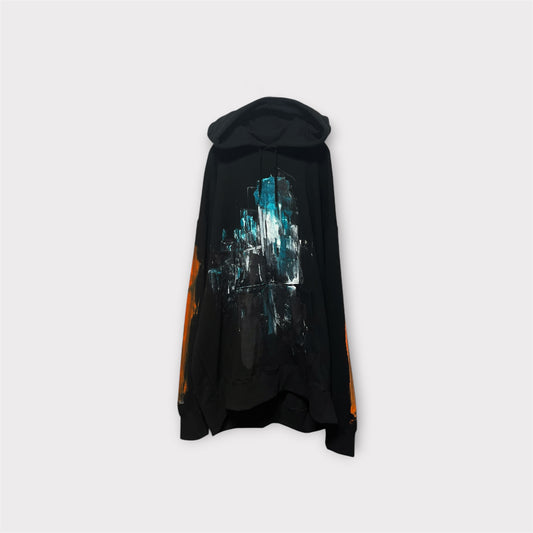 Aggressive paint extra over hoodie