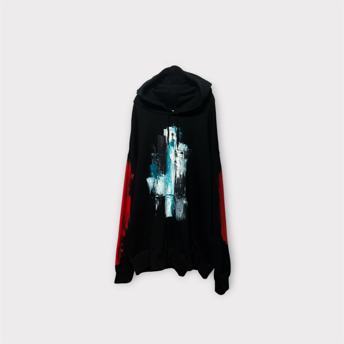 Aggressive paint extra over hoodie