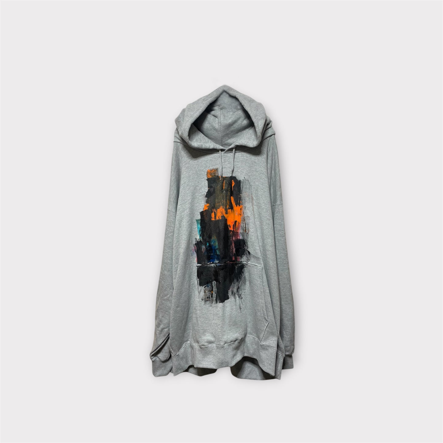 Aggressive paint extra over hoodie