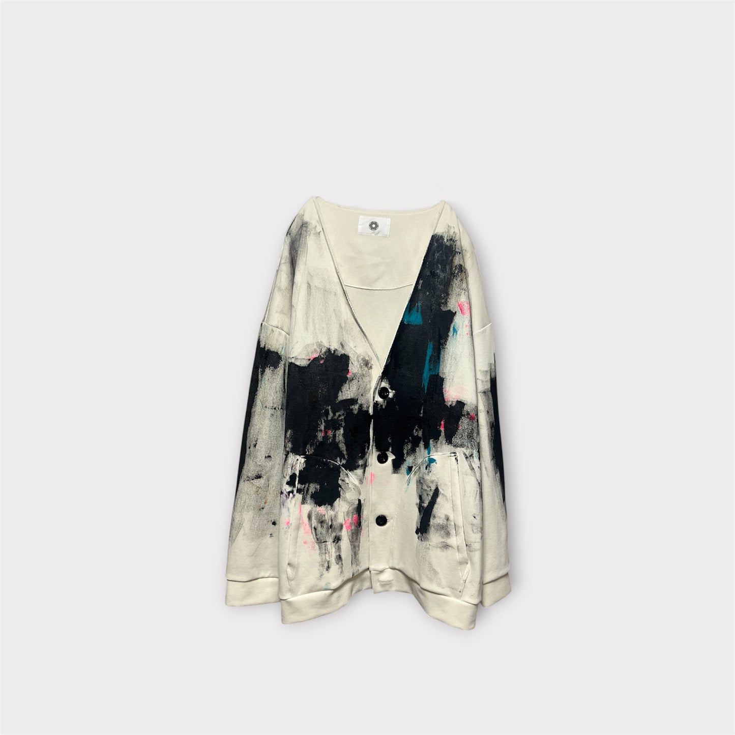 Aggressive paint over cardigan