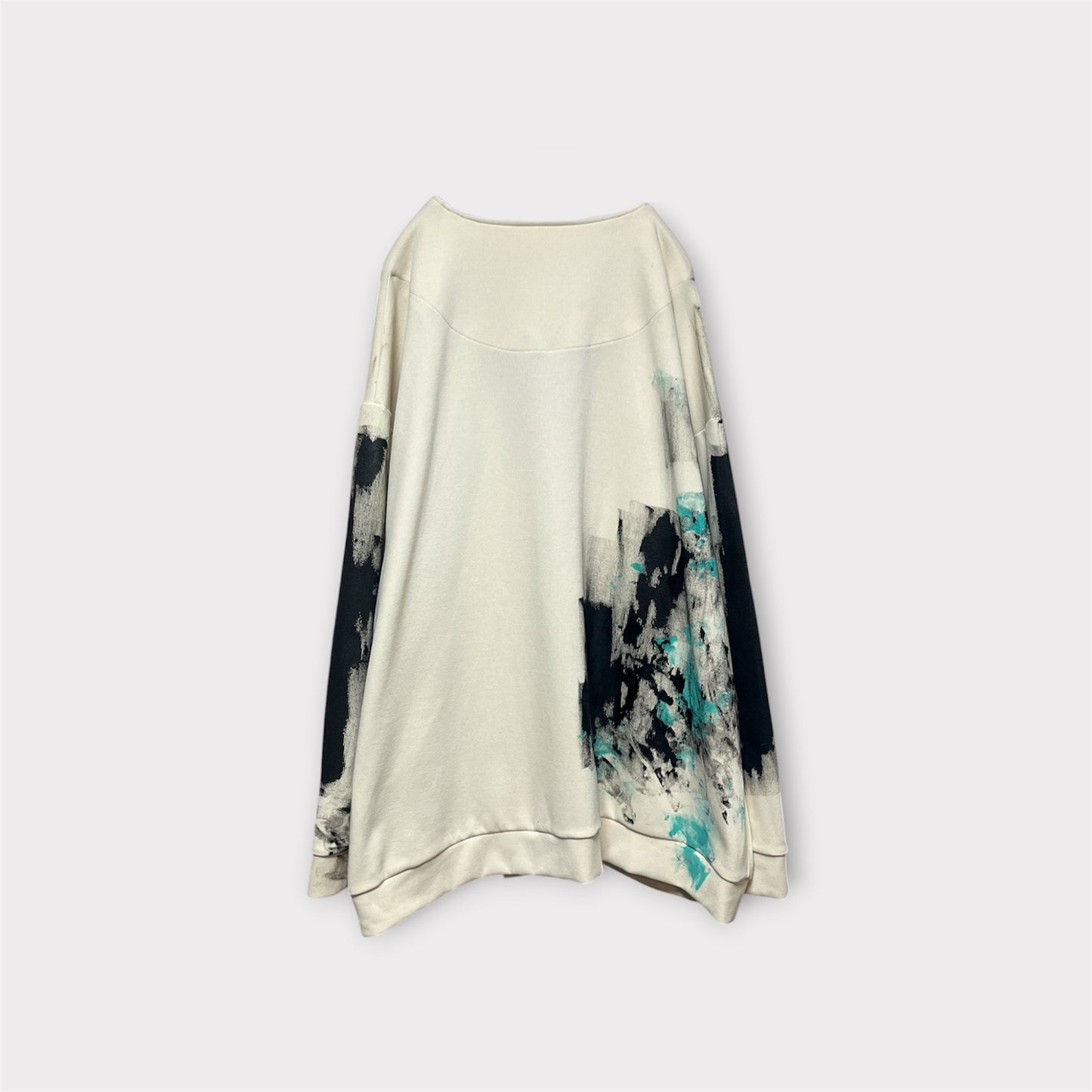 Aggressive paint over cardigan