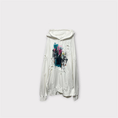 Aggressive paint extra over hoodie