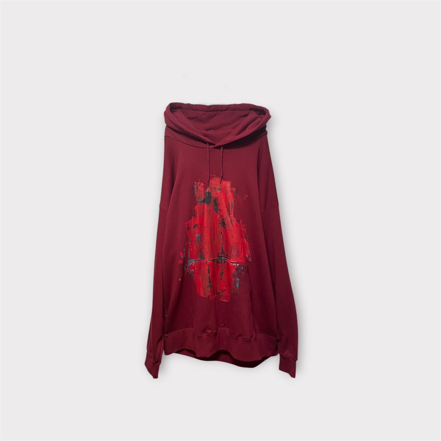 Aggressive paint extra over hoodie